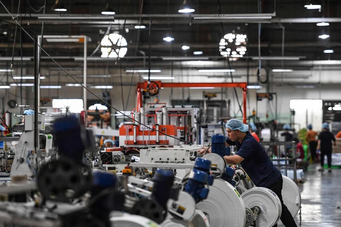 A packaging factory in Ho Chi Minh City on Dec 2, 2022. Vietnam's new factory orders in December recorded the worst rate of contraction since September 2021. 