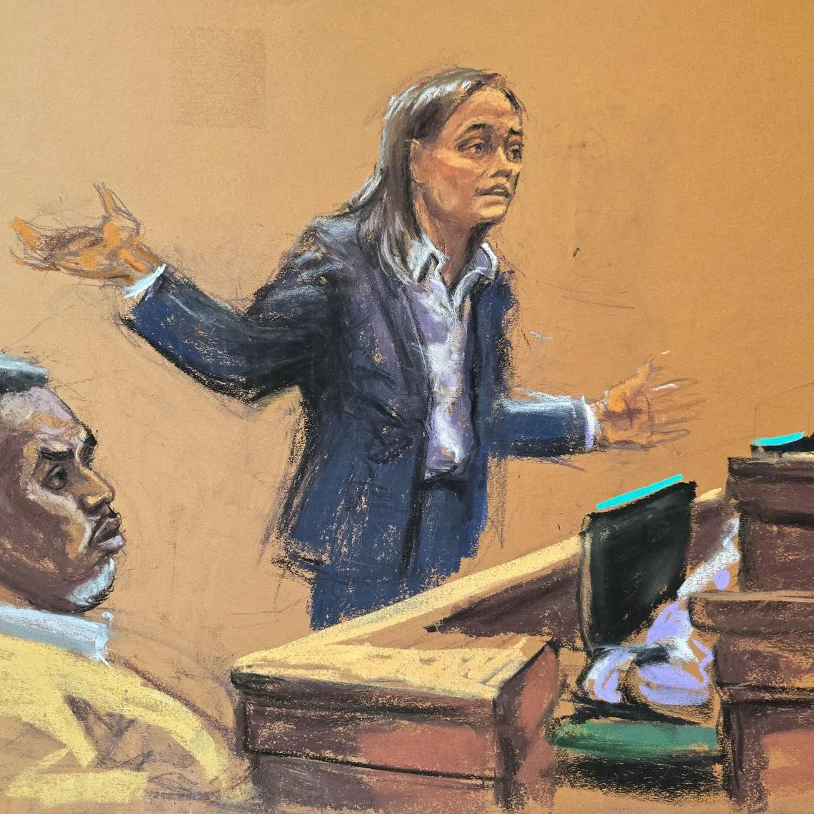Sean "Diddy" Combs listens as prosecutor Maurene Comey makes her closing arguments during Combs' sex trafficking trial in New York City in June.