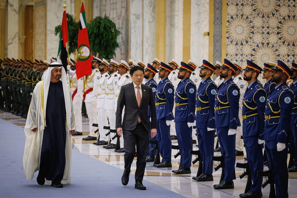 Prime Minister Lawrence Wong was welcomed with a ceremony at the Qasr Al Watan in Abu Dhabi, where United Arab Emirates President Sheikh Mohamed bin Zayed Al Nahyan received him on Oct 21.