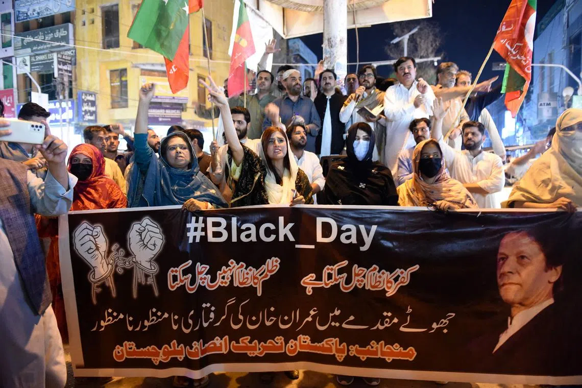 Supporters of Pakistan's former prime minister Imran Khan shout anti-government slogans during a protest in Quetta.