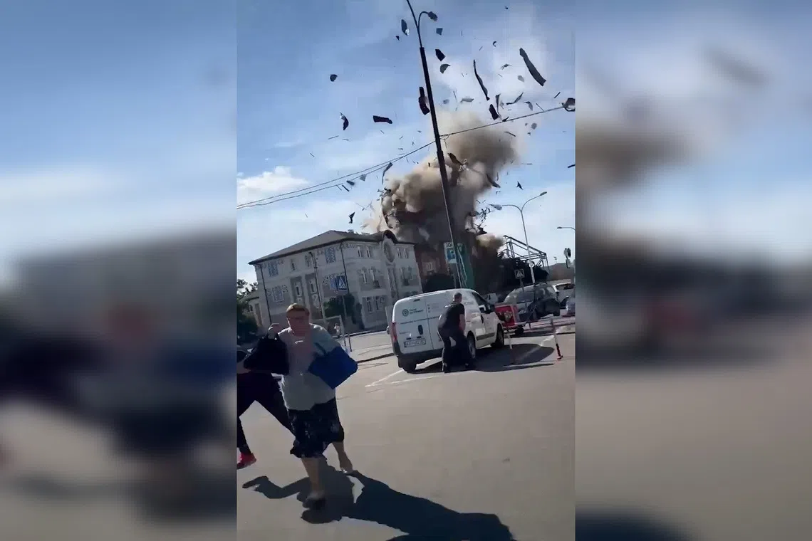 A Russian missile hitting Ukraine's National University of Pharmacy in Kharkiv on Sept 16.