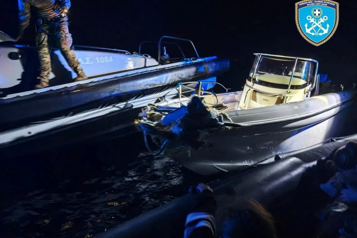 A boat that was carrying migrants is seen alongside a Greek Coast Guard patrol vessel following a collision in which six migrants died, off Lesbos, Greece, October 19, 2026. Hellenic Coast Guard/Handout via REUTERS