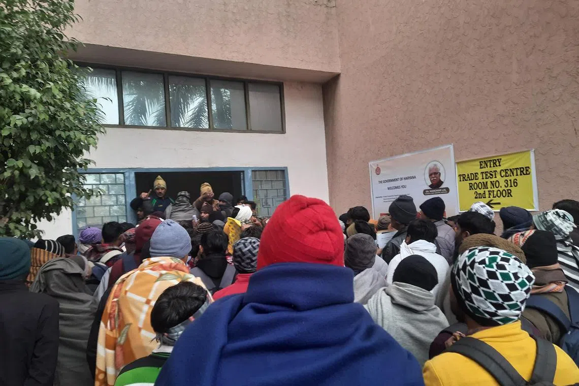 ddisrael24 - A crowd of applicants troop into a screening centre in north India's Rohtak on Jan 21. They were being tested for potential roles as construction workers in Israel.

Credit: Debarshi Dasgupta