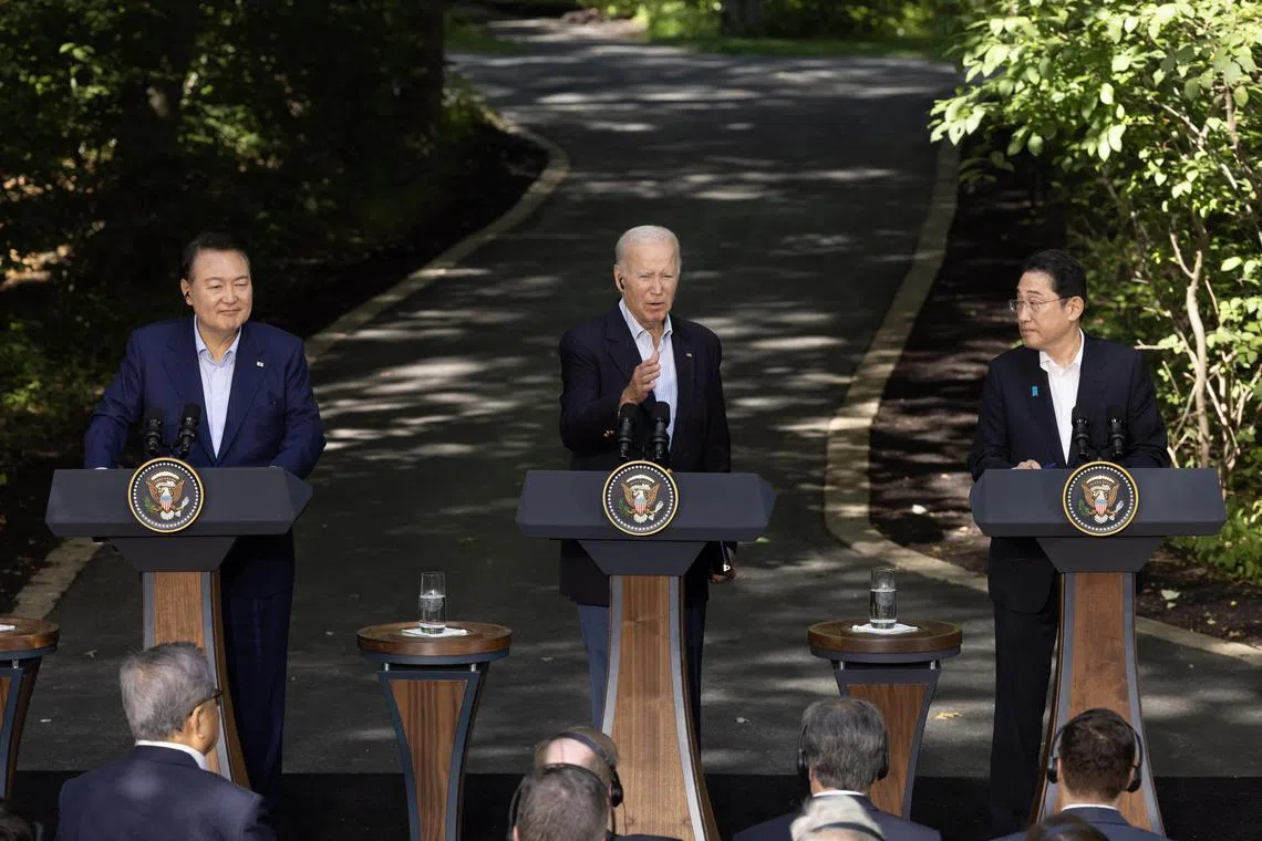(From left) South Korean President Yoon Suk Yeol, US President Joe Biden and Japan's PM Kishida Fumio during the trilateral summit on Aug 18.