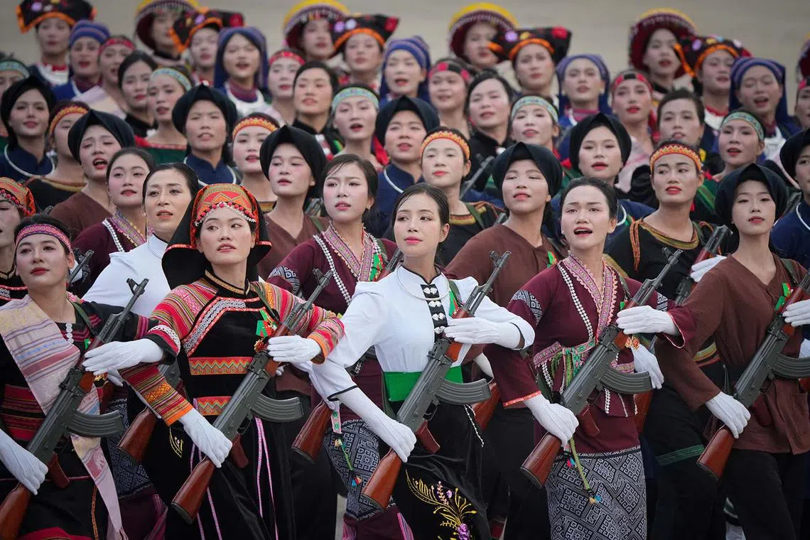 Vietnamese minority troops marching during a parade celebrating the 80th anniversary of independence in Hanoi, Vietnam, Sept 2, 2025. 