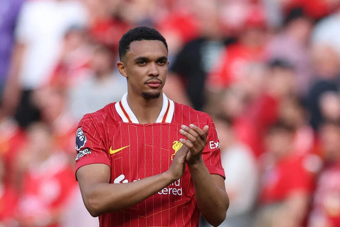 Liverpool's Trent Alexander-Arnold applauds fans after the 2-2 Premier League draw with Arsenal.