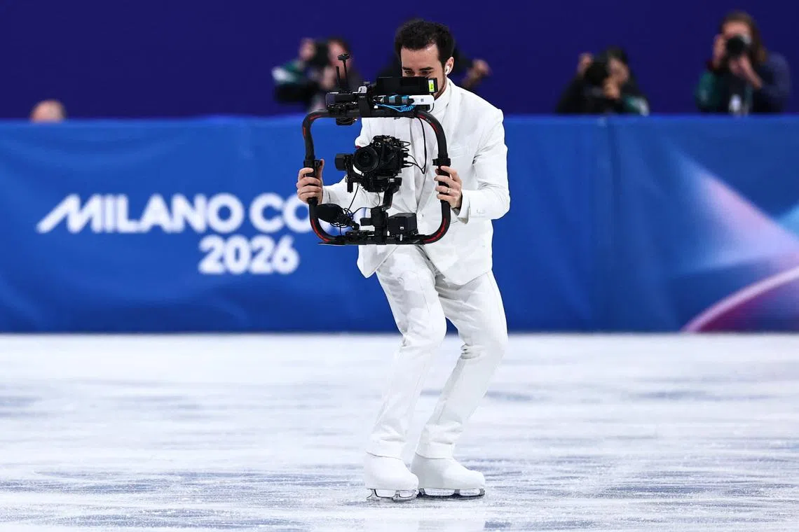 Milano Cortina 2026 Olympics - Figure Skating - Women Single Skating - Short Program - Milano Ice Skating Arena, Milan, Italy - February 17, 2026. Camera operator and former ice dancer Jordan Cowan during the Short Program REUTERS/Amanda Perobelli