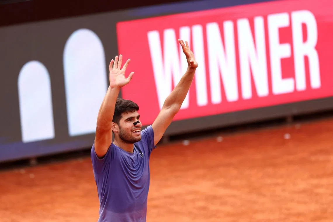 Spain's Carlos Alcaraz celebrates after winning his quarter-final match against Britain's Jack Draper.