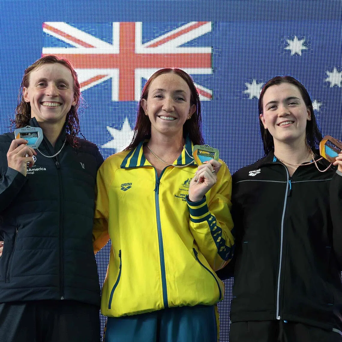 (From left_ Katie Ledecky of the US, Australia’s Lani Pallister and Erika Fairweather of New Zealand with their respective silver, gold and bronze medals on Aug 14.
