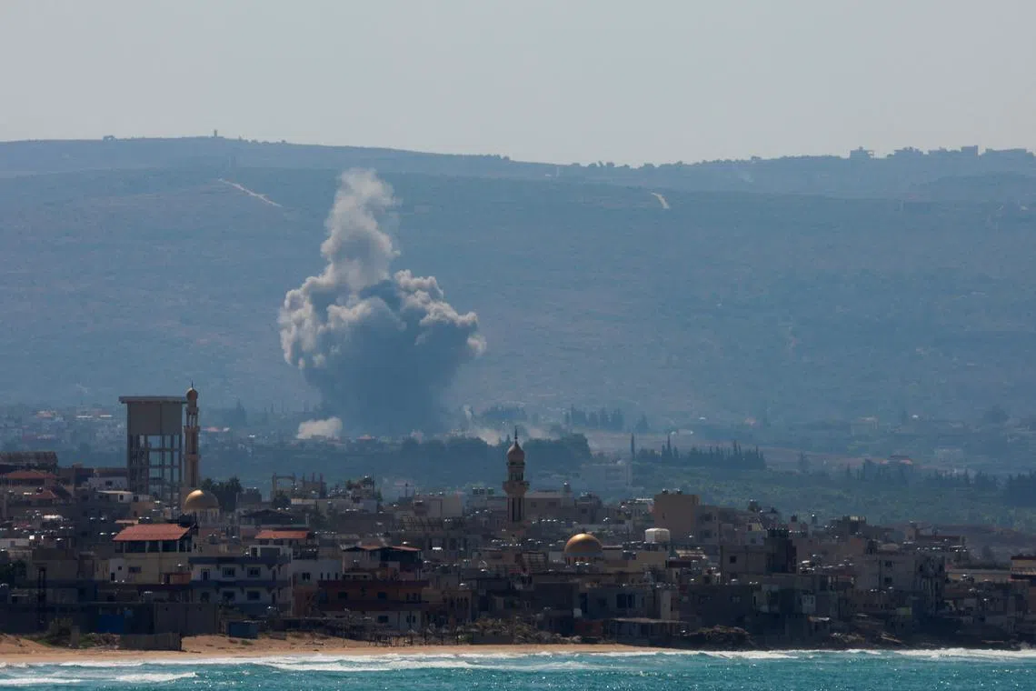 Smoke billows over southern Lebanon, amid ongoing cross-border hostilities between Hezbollah and Israeli forces, as seen from Tyre, southern Lebanon September 24, 2024 REUTERS/Aziz Taher