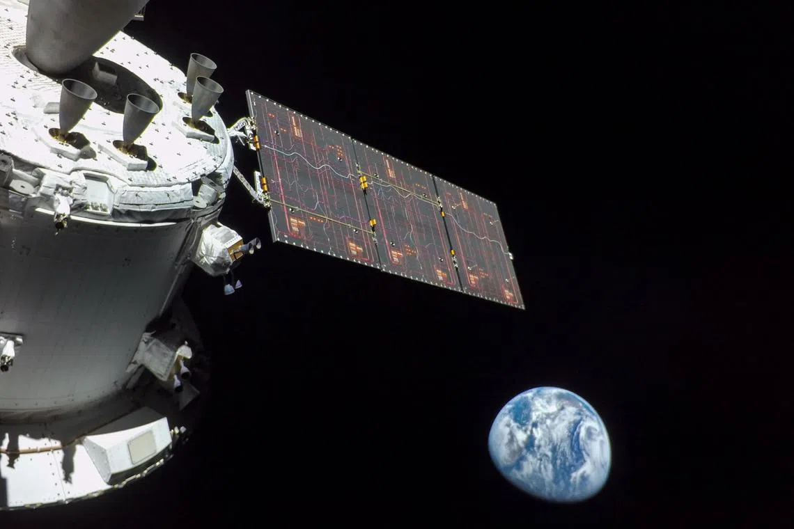 An undated photo provided by NASA of Earth, photographed from the Orion space capsule. The capsule, this time with no astronauts aboard, will splash down on Sunday afternoon after a 26-day journey that took it to the moon and back. (NASA via The New York Times) — FOR EDITORIAL USE ONLY