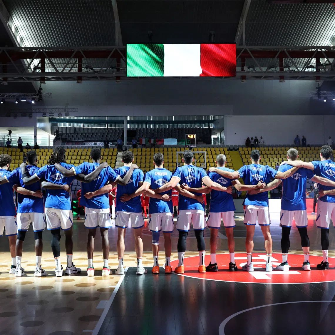 FILE PHOTO: Basketball - FIBA EuroBasket 2025 - Group Phase - Italy v Georgia - Spyros Kyprianou Athletic Center, Limassol, Cyprus - August 30, 2025 Italy's players line up during the national anthems before the match REUTERS/Yiannis Kourtoglou/File Photo