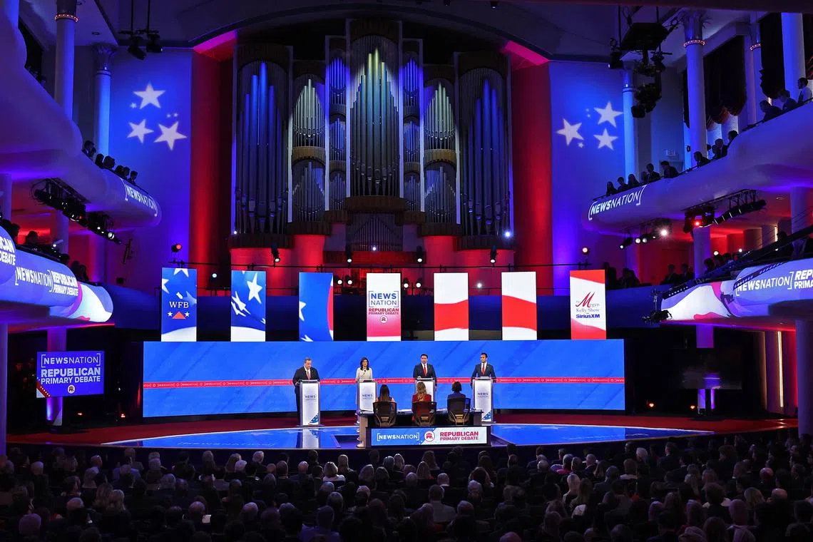 Republican presidential candidates (left) former New Jersey Governor Chris Christie, former UN Ambassador Nikki Haley, Florida Govenor Ron DeSantis and Vivek Ramaswamy participate in the NewsNation Republican Presidential Primary Debate at the University of Alabama Moody Music Hall on Dec 6, 2023, in Tuscaloosa, Alabama. The four presidential hopefuls squared off during the fourth Republican primary debate without current front runner and former US President Donald Trump, who has declined to participate in any of the previous debates.   