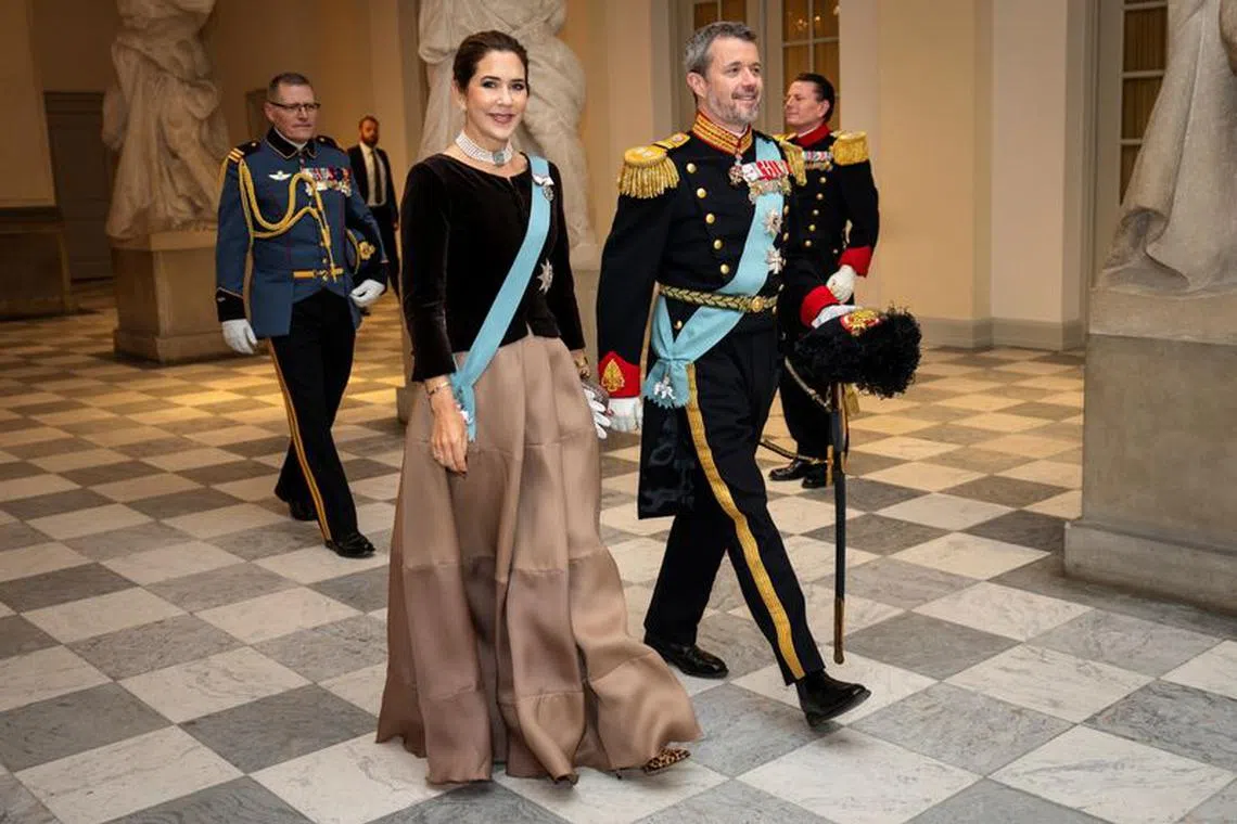 FILE PHOTO: Denmark's Crown Prince Frederik and Crown Princess Mary attend the New Year's reception for officers from the Armed Forces and the National Emergency Management Agency, as well as invited representatives of major national organizations and the royal patronage, at Christiansborg Castle in Copenhagen, Denmark January 4, 2024. Ritzau Scanpix/Mads Claus Rasmussen via REUTERS