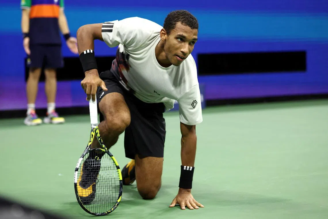 Tennis - U.S. Open - Flushing Meadows, New York, United States - September 5, 2025 Canada's Felix Auger-Aliassime reacts during his semi final match against Italy's Jannik Sinner REUTERS/Kevin Lamarque