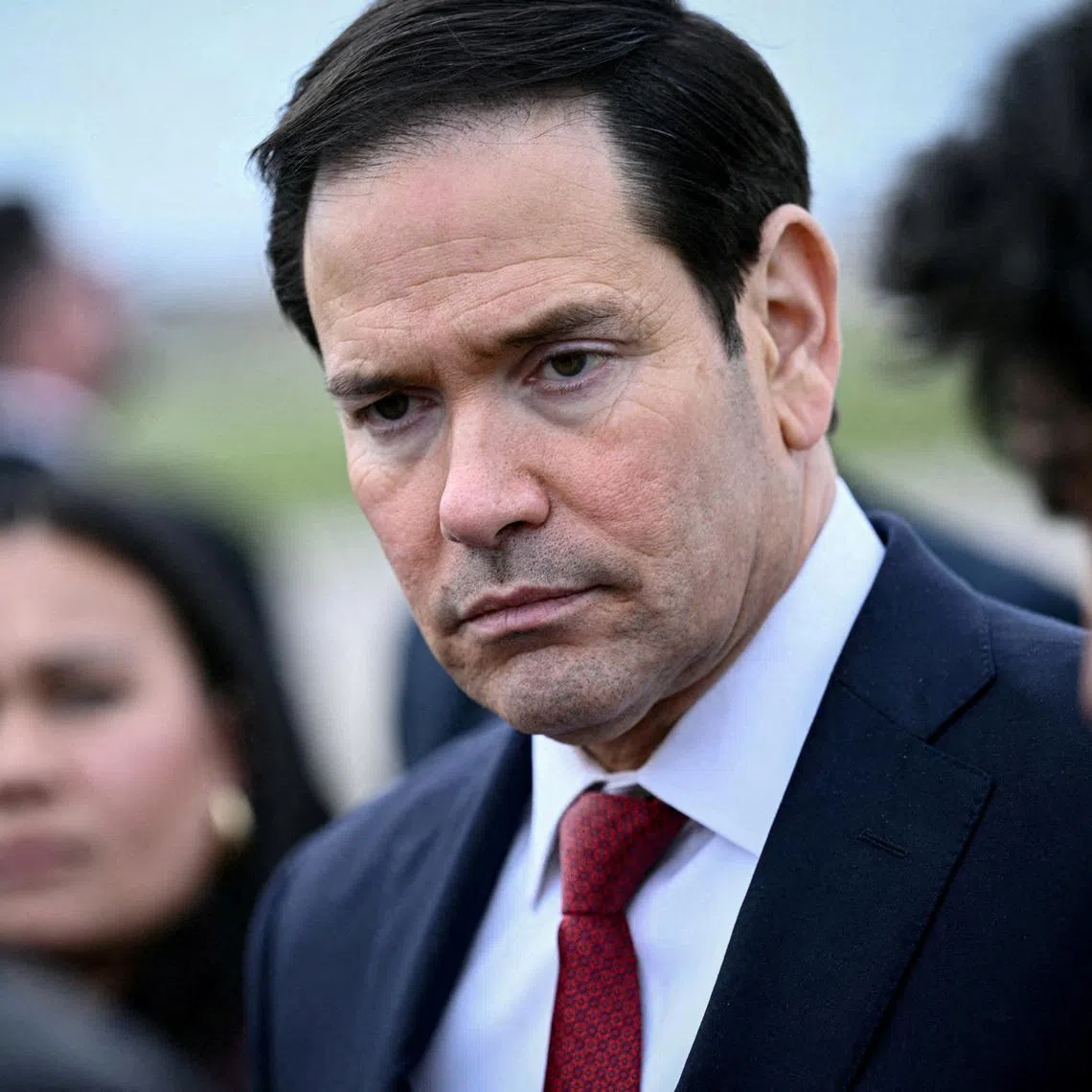 FILE PHOTO: US Secretary of State Marco Rubio looks on as he speaks to the press before his departure following a G7 Foreign Ministers' meeting with Partner Countries before his departure at the Bourget airport in Le Bourget, outside Paris, France, March 27, 2026.   Brendan Smialowski/Pool via REUTERS/File Photo