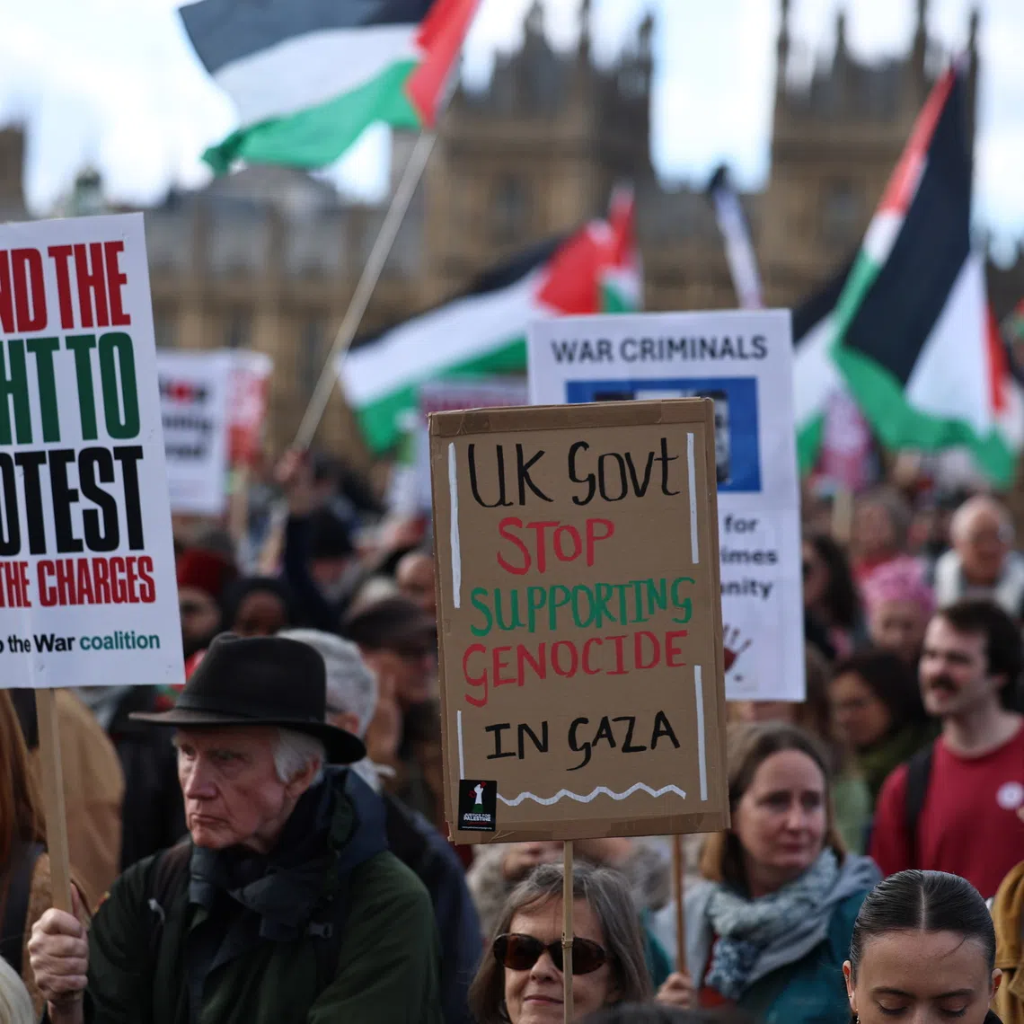 Protesters take part in the National March for Palestine, organised by the Palestine Coalition in London, Britain, on Oct 10.