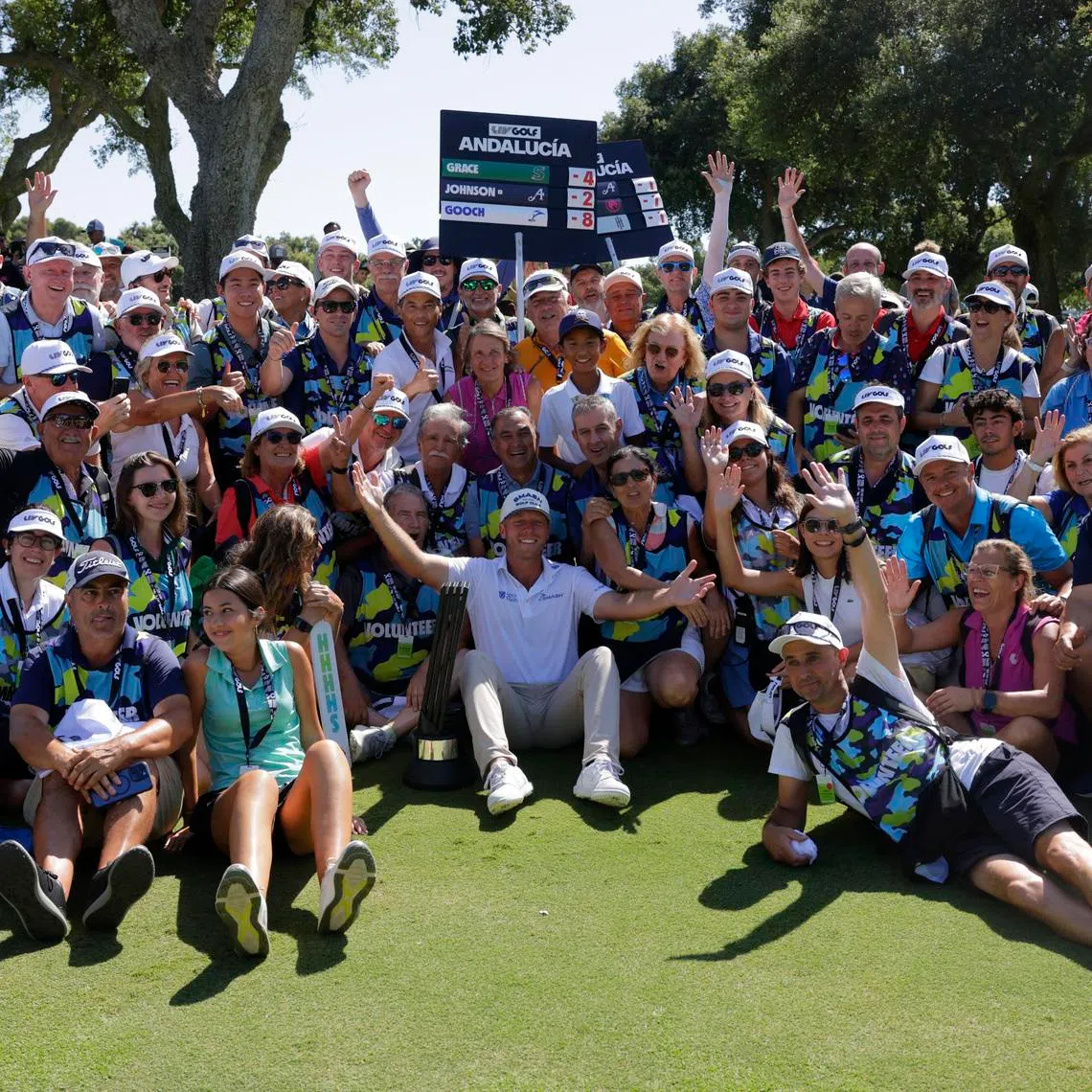 Golf - LIV Golf - Andalucia - Real Club Valderrama, Sotogrande, Spain - July 13, 2025 Smash GC's Talor Gooch celebrates with spectators after winning the LIV Golf Andalucia REUTERS/Jon Nazca
