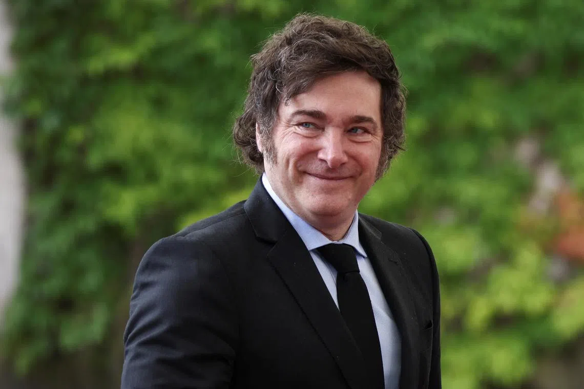 Argentine President Javier Milei looks on as he is received by German Chancellor Olaf Scholz at the Chancellery in Berlin, Germany, June 23, 2024. REUTERS/Liesa Johannssen/File Photo