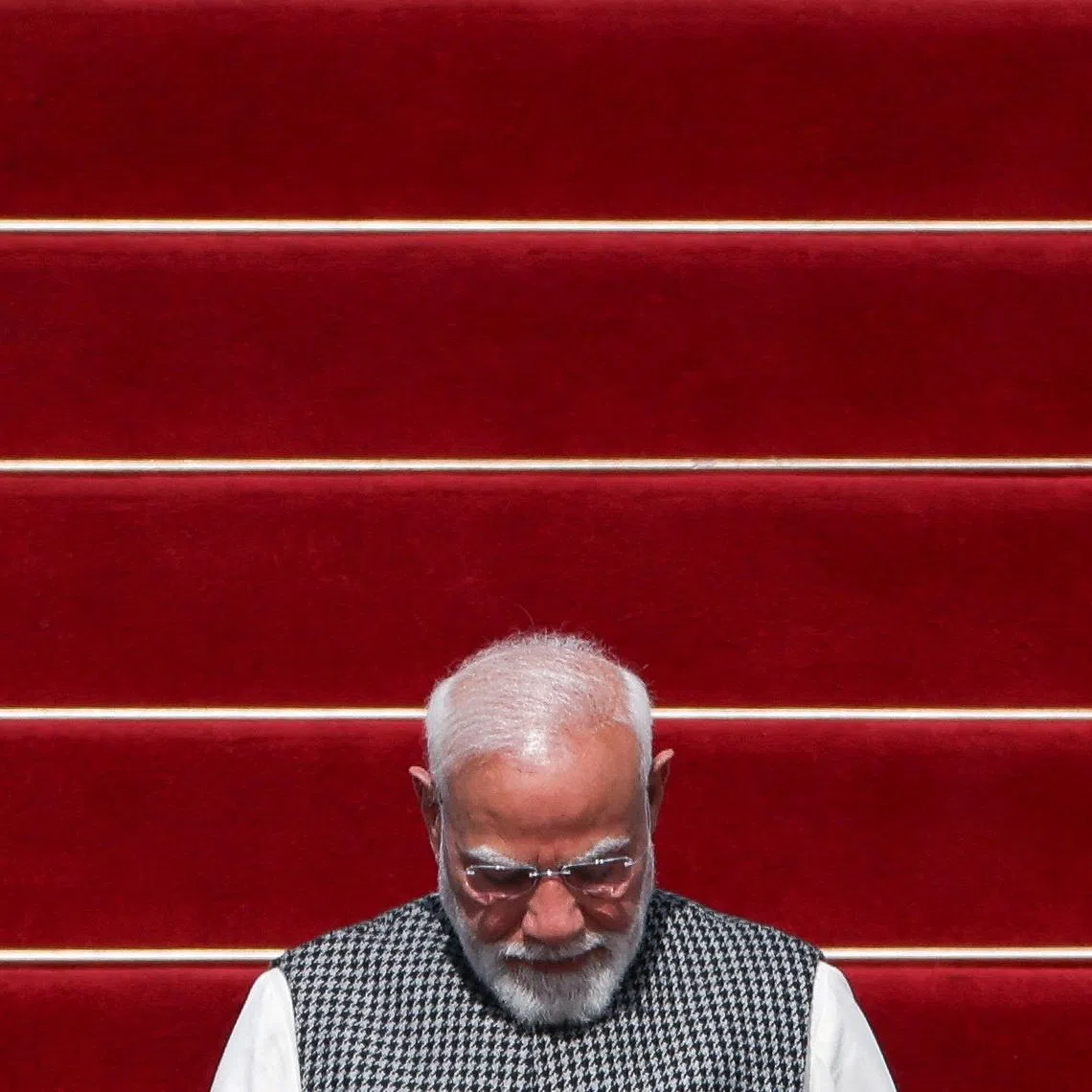 FILE PHOTO: India's Prime Minister Narendra Modi disembarks a plane as he arrives at Ben Gurion International Airport in Lod, near Tel Aviv, Israel February 25, 2026. REUTERS/Shir Torem/File Photo