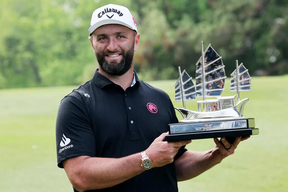 Legion XIII's Jon Rahm posing with his trophy after winning LIV Golf Hong Kong on March 8.