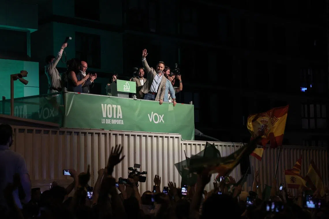 Spanish far-right Vox party leader Santiago Abascal (centre) greeting supporters at the party headquarters in Madrid on July 23, 2023.