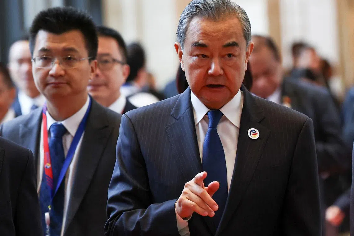 China's Foreign Minister Wang Yi attends the 57th ASEAN Foreign Ministers' Meeting at National Convention Center, in Vientiane, Laos, July 26, 2024. REUTERS/Chalinee Thirasupa
