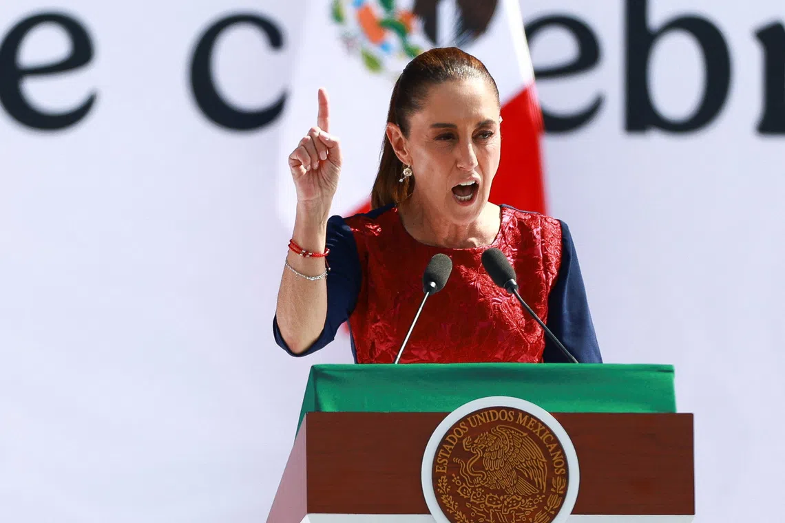 Mexico's President Claudia Sheinbaum speaks during an event in Zocalo Square to commemorate 7 years since her party, Morena, came to power, in Mexico City, Mexico December 6, 2025. REUTERS/Raquel Cunha