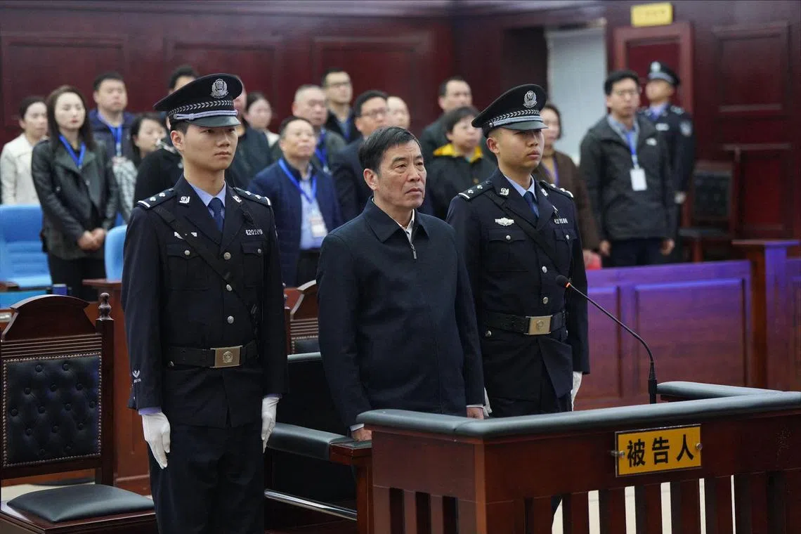 Former chairman of Chinese Football Association Chen Xuyuan (centre) during his trial at the Huangshi Intermediate People’s Court in Huangshi city, in central Hubei province, on March 26.