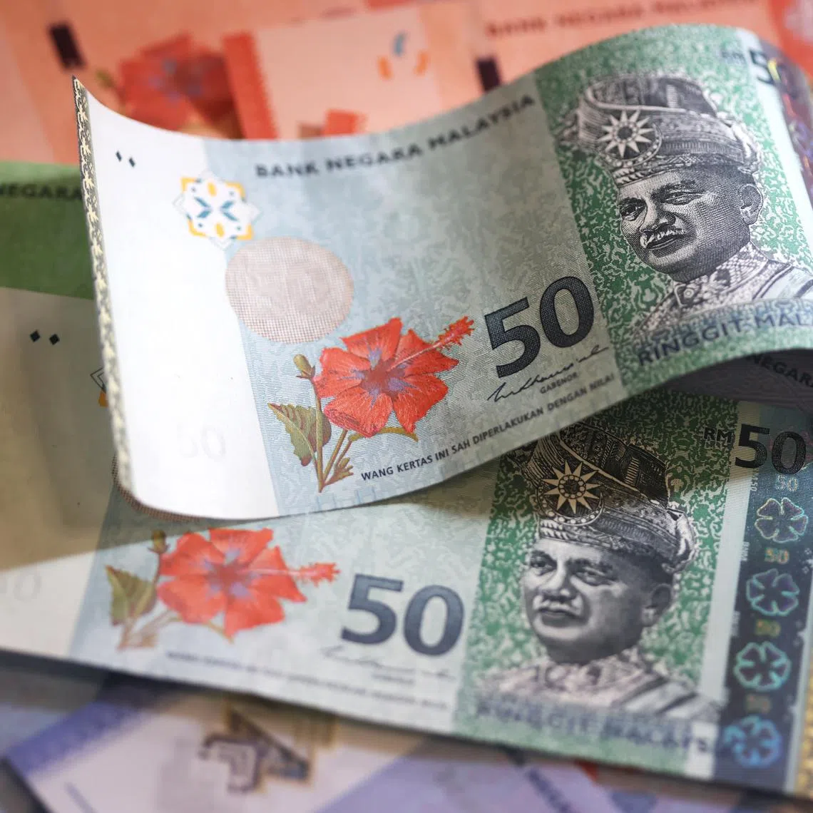 Against the Singapore dollar, the ringgit was trading at 3.1276 at 9.35am, down 0.7 per cent from its close last Friday (Jan 23). 