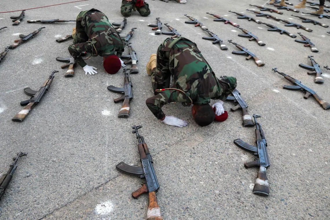 Kurdish Peshmerga forces celebrating after a graduation ceremony in the city of Arbil, the capital of the autonomous Kurdish region of northern Iraq, on July 27, 2025. 