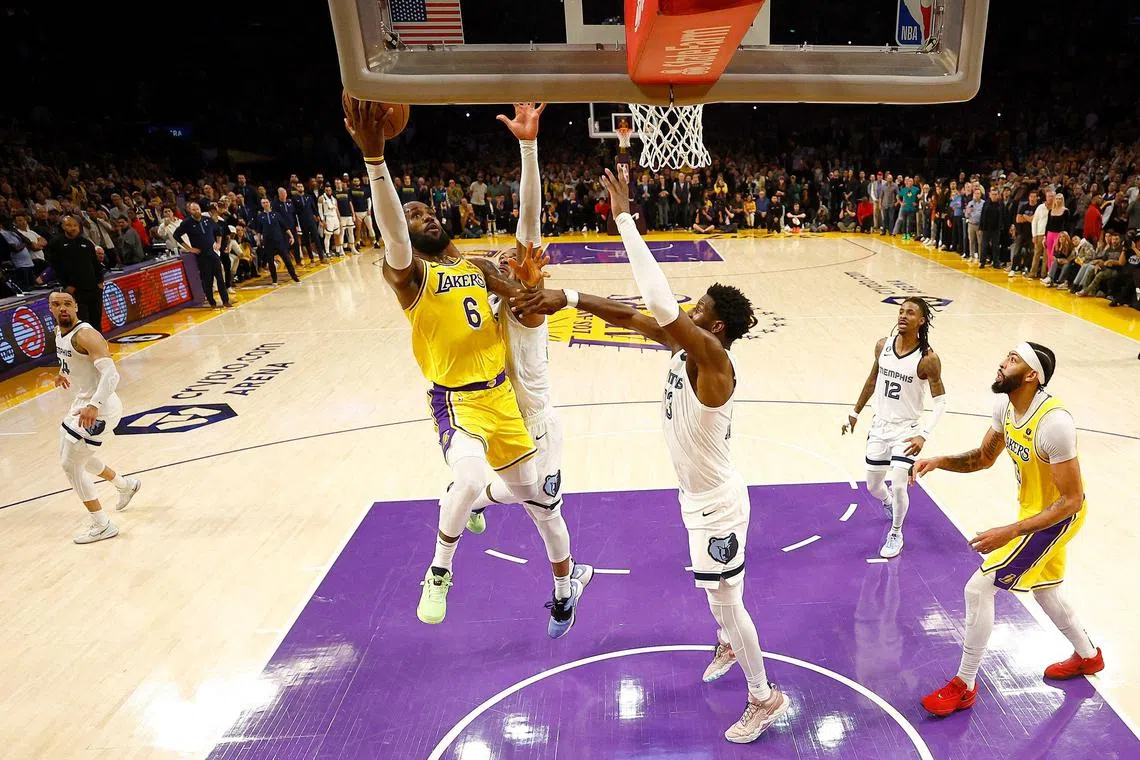 LeBron James of the Los Angeles Lakers makes a shot against the Memphis Grizzlies in the fourth quarter of Game 4 of the NBA play-offs.