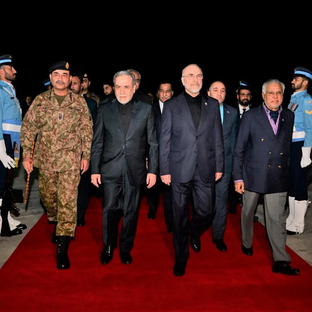 The Iranian delegation led by parliament speaker Mohammad Baqer Qalibaf and Foreign Minister Abbas Araqchi is welcomed by Pakistan's Chief of Army Staff (COAS) Asim Munir and Minister for Foreign Affairs Mohammad Ishaq Dar, as Pakistan prepares to host the U.S. and Iran for peace talks, in Islamabad, Pakistan April 10, 2026. Pakistan's Ministry of Foreign Affairs/Handout via REUTERS