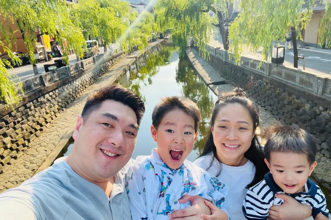 Eldric Chew with sons Enzo and Eizen and wife 