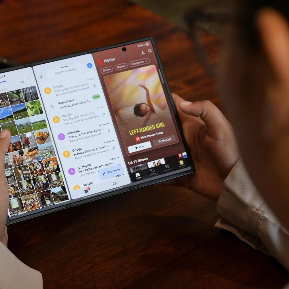 A member of the media trying out the Samsung Galaxy Z TriFold on Dec 3, 2025.