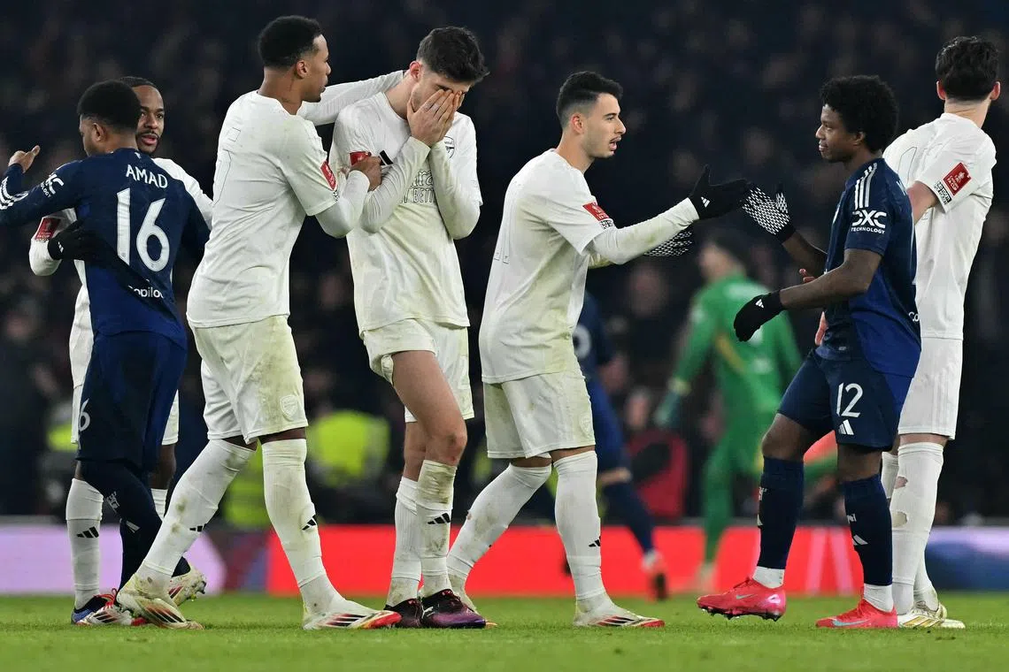 Arsenal midfielder Kai Havertz (centre) reacts after Arsenal losses the peanlty shoot-out against Manchester United in the FA Cup. 