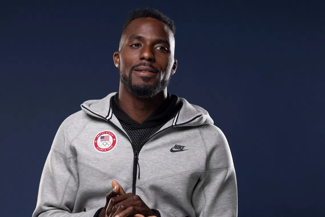 American track and field sprinter Kenny Bednarek poses for a portrait during the Team USA media summit ahead of the Paris Olympics and Paralympics, at an event in New York, U.S., April 16, 2024. REUTERS/Andrew Kelly