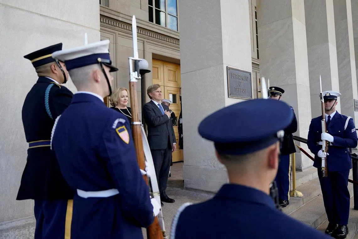 Undersecretary of Defense for Policy Elbridge Colby listens to the national anthem as he welcomes New Zealand Defense Minister Judith Collins at the Pentagon in Washington, D.C., U.S., October 20, 2025. REUTERS/Al Drago