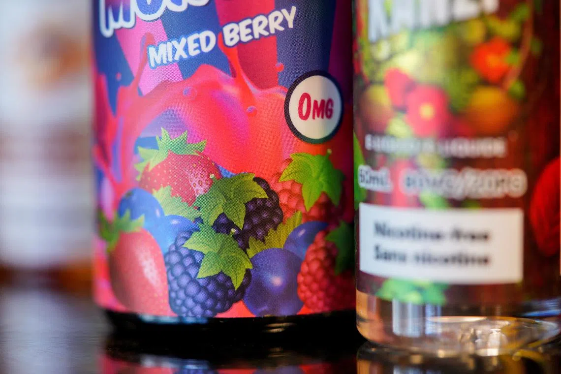 FILE PHOTO: Flavoured vape juices stand on a counter at a vape store, in Melbourne, Australia, May 2, 2023.  REUTERS/Sandra Sanders/File Photo