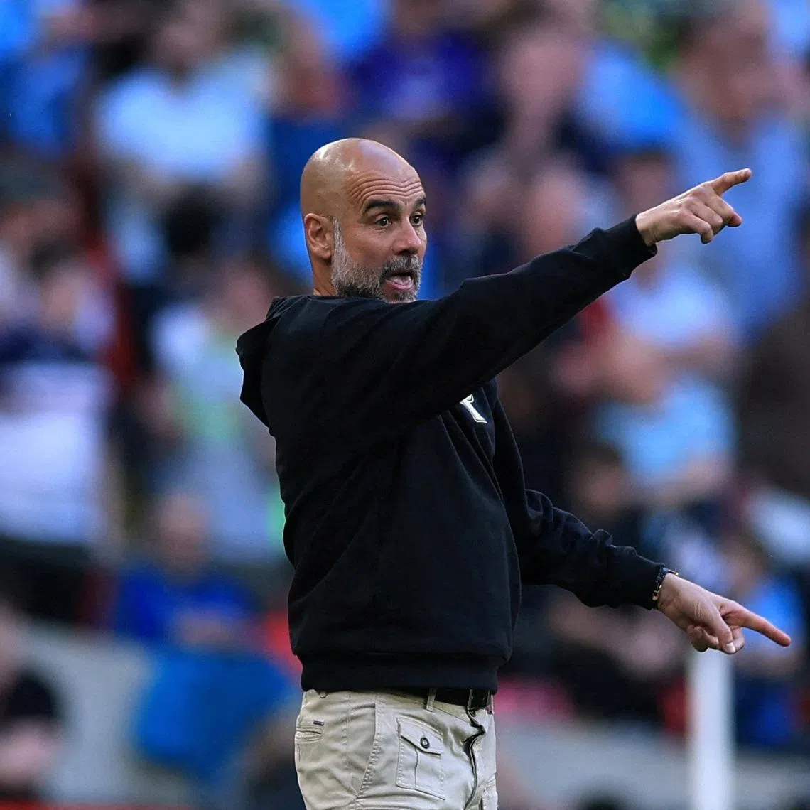 FILE PHOTO: Soccer Football - FA Cup - Semi Final - Manchester City v Southampton - Wembley Stadium, London, Britain - April 25, 2026 Manchester City manager Pep Guardiola reacts during the match Action Images via Reuters/Paul Childs/File Photo
