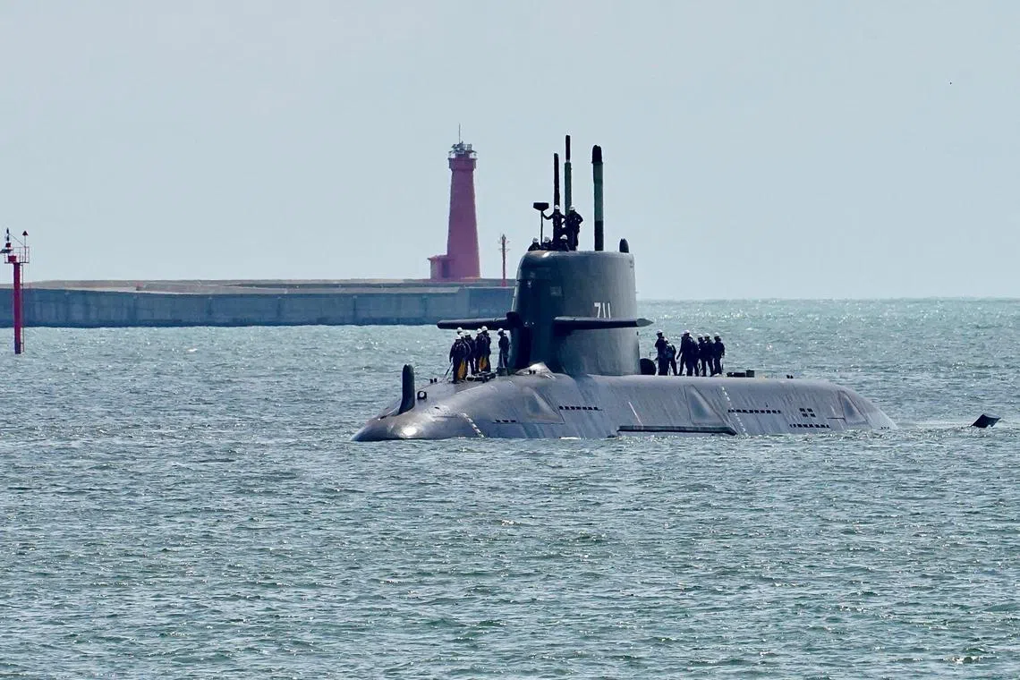 This picture taken and released by Taiwan’s Central News Agency (CNA) on June 17, 2025 shows the Hai Kun class submarine, Taiwan’s first domestically built submarine, carrying out first tests at sea in the southern port of Kaohsiung. Taiwan has started sea trials of its first domestically built submarine, as the self-ruled island upgrades its military capabilities to defend against a potential Chinese attack. (Photo by Chun-Chih Tung / CNA / AFP) / - Taiwan OUT - China OUT - Macau OUT / Hong Kong OUT / RESTRICTED TO EDITORIAL USE -- Taiwan’s Central News Agency (CNA)