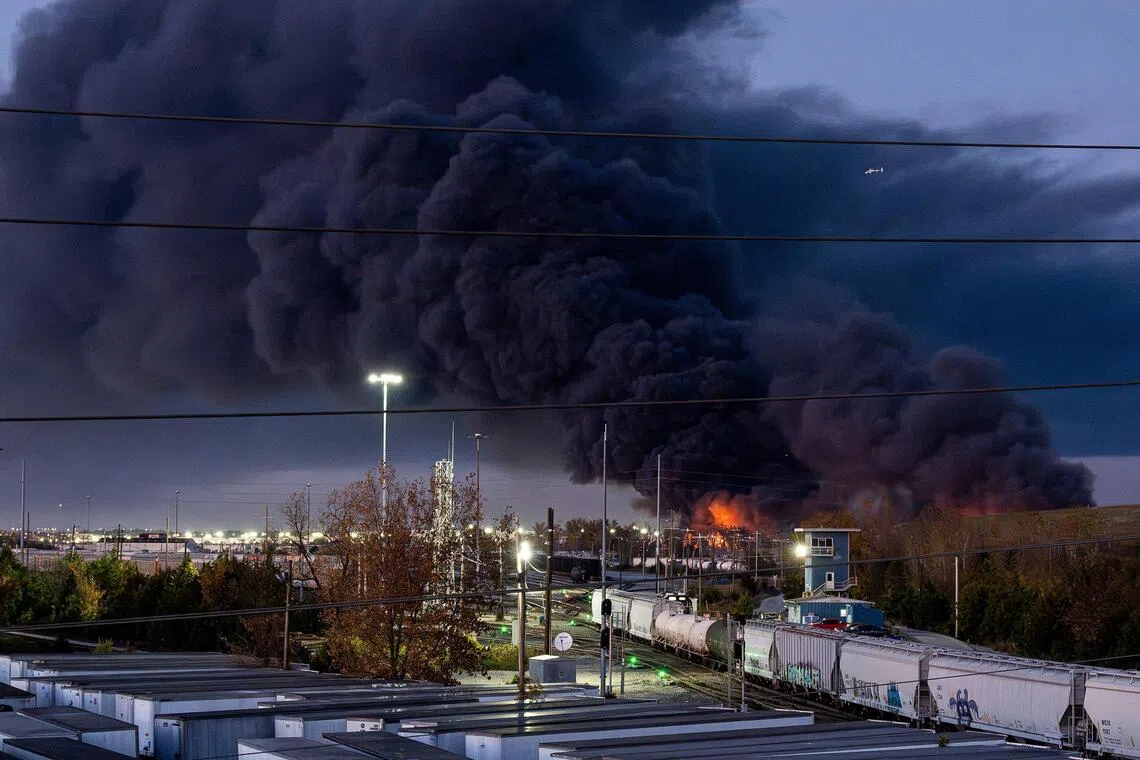 Smoke rising from the wreckage of a UPS MD-11 cargo jet after it crashed on departure from Louisville Muhammad Ali International Airport in Louisville, Kentucky, on Nov 4. 