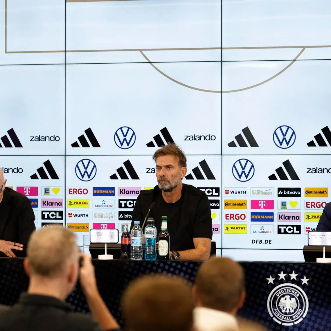 Soccer Football - Germany DFB announces new manager of national soccer team - DFB Campus, Frankfurt, Germany - July 24, 2026 Juergen Klopp, newly appointed manager of German national soccer team, attends a press conference with DFB President Bernd Neuendorf and Vice President Hans-Joachim Watzke REUTERS/Heiko Becker
