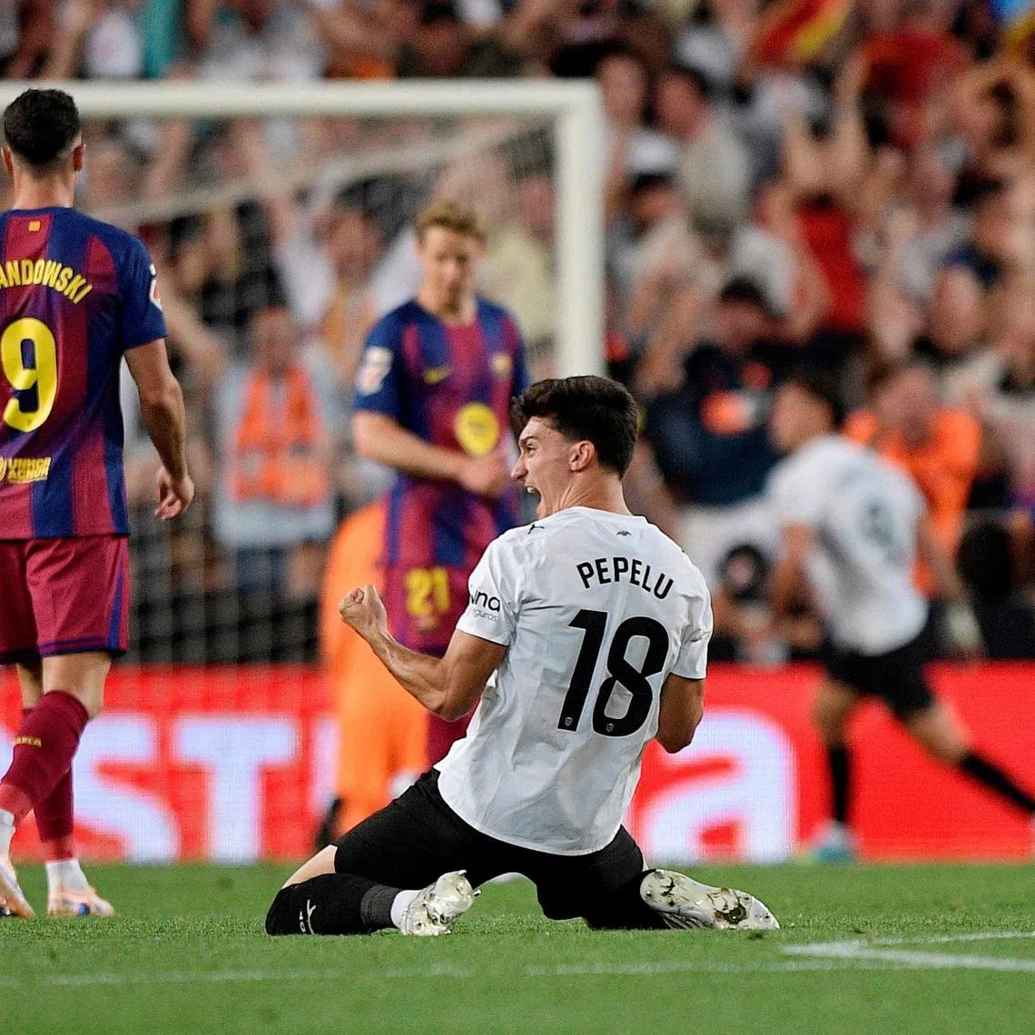Soccer Football - LaLiga - Valencia v FC Barcelona - Estadio de Mestalla, Valencia, Spain - May 23, 2026 Valencia's Pepelu celebrates their third goal scored by Guido Rodriguez REUTERS/Pablo Morano