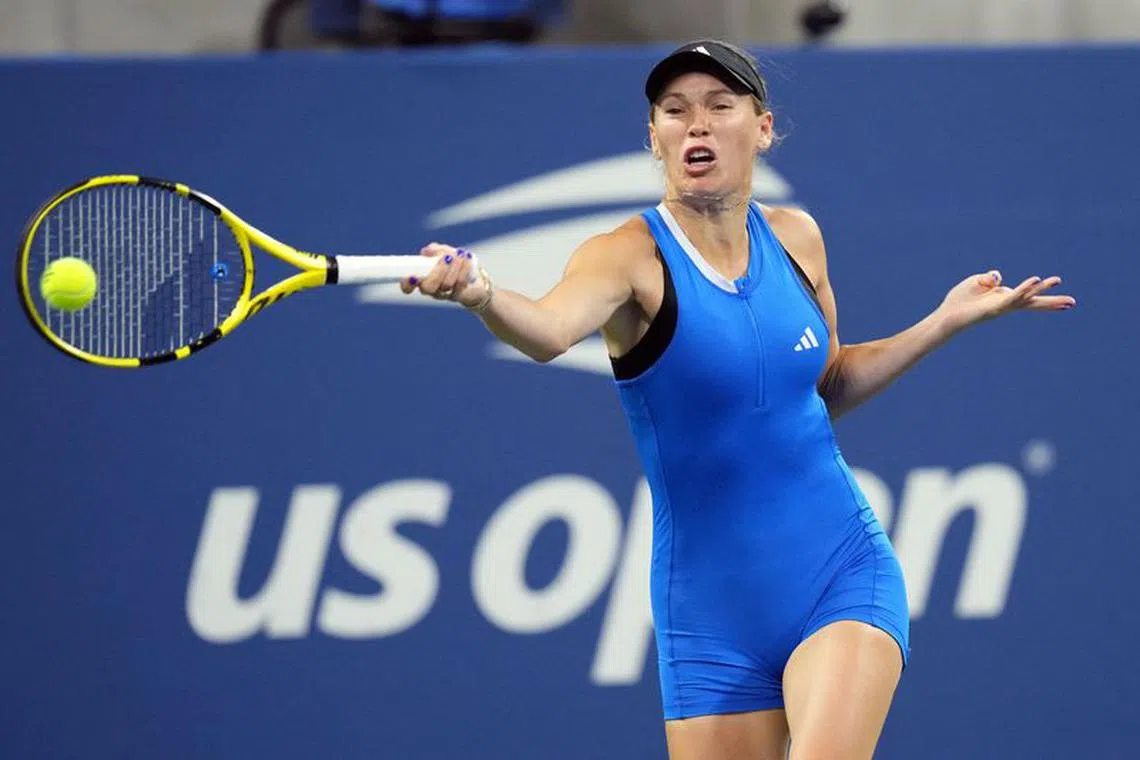 Aug 28, 2023; Flushing, NY, USA; Caroline Wozniacki of Denmark hits to Tatiana Prozorova on day one of the 2023 U.S. Open at the Billie Jean King Tennis Center. Mandatory Credit: Danielle Parhizkaran-USA TODAY Sports