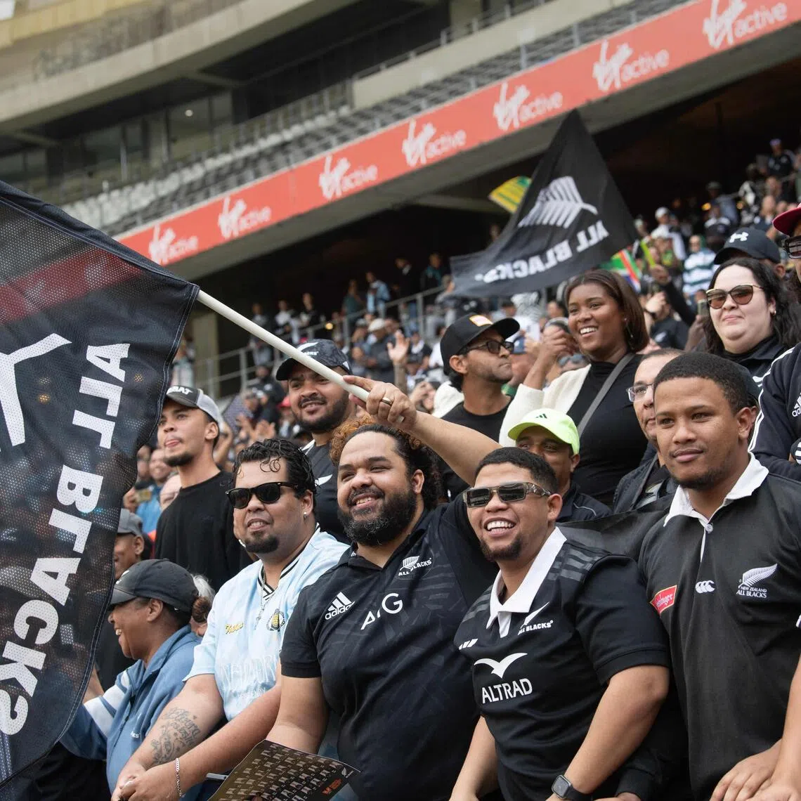 All Blacks fans cheering during the New Zealand national rugby team’s “Welcome to Country” event at the Cape Town Stadium on July 31.