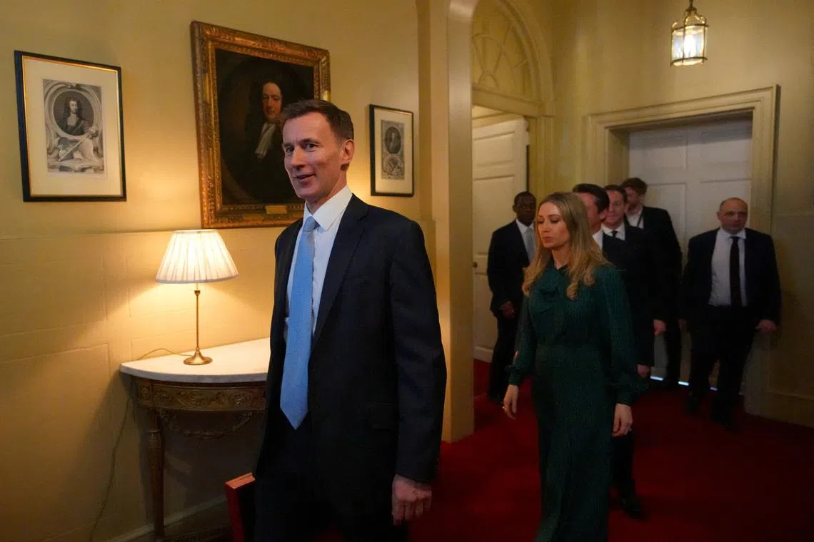 Britain's Chancellor of the Exchequer Jeremy Hunt leaves 11 Downing Street with the despatch box to present his spring budget to the parliament on March 6, 2024, in London, Britain. Carl Court/Pool via REUTERS