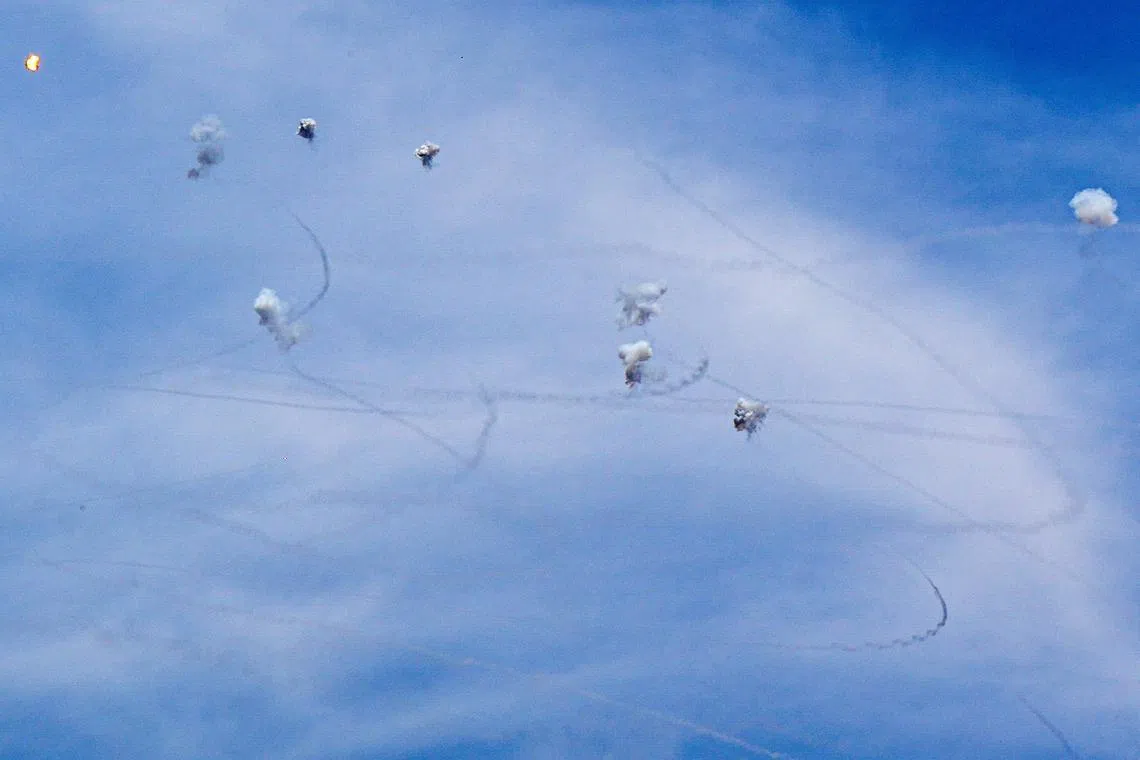 Israel's Iron Dome anti-missile system intercepting rockets launched from Lebanon, amid ongoing cross-border hostilities between Hezbollah and Israeli forces, as seen from the Hula Valley in northern Israel, on May 23, 2024. 