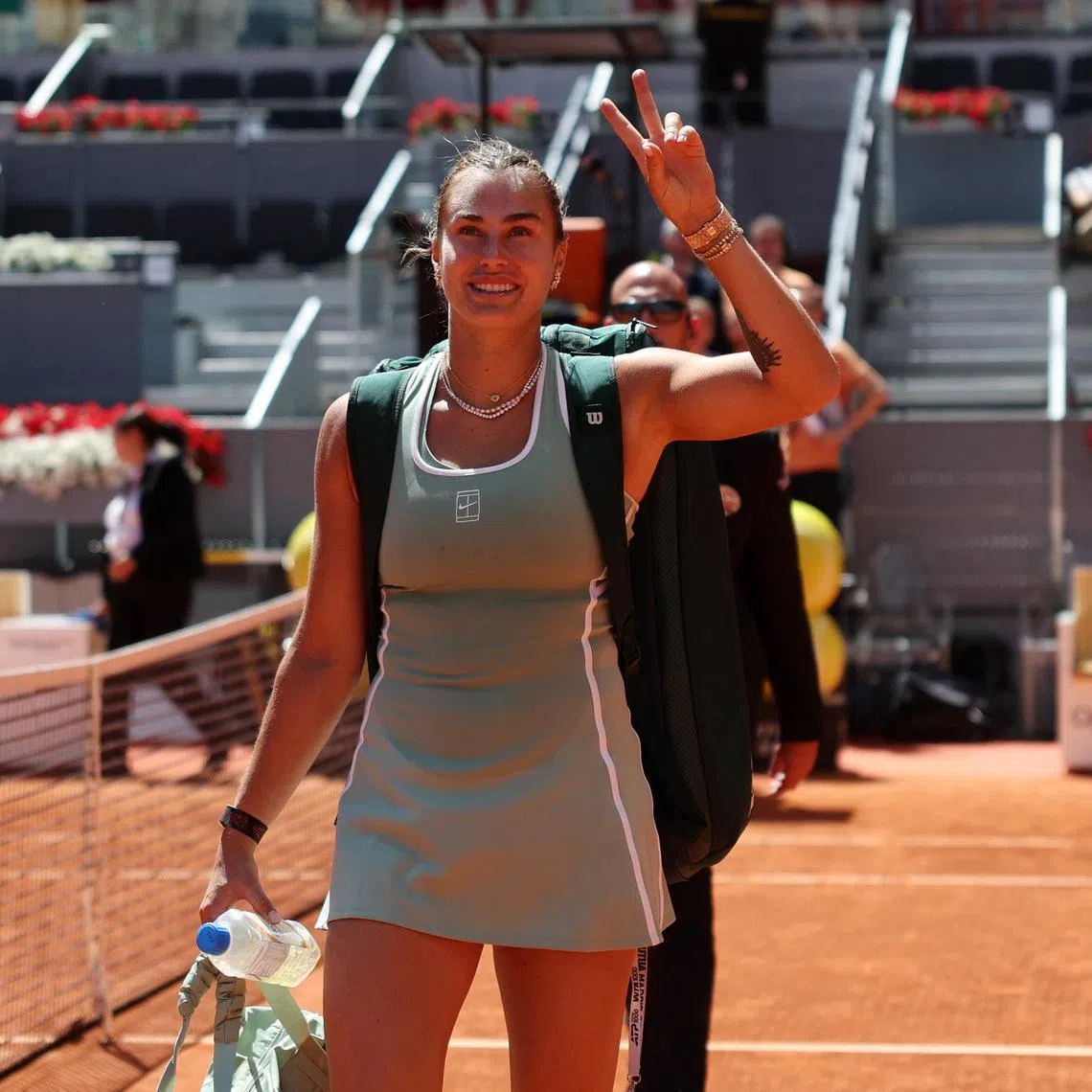Tennis - Madrid Open - Park Manzanares, Madrid, Spain - April 27, 2026 Belarus' Aryna Sabalenka celebrates after winning her round of 16 match against Japan's Naomi Osaka REUTERS/Violeta Santos Moura