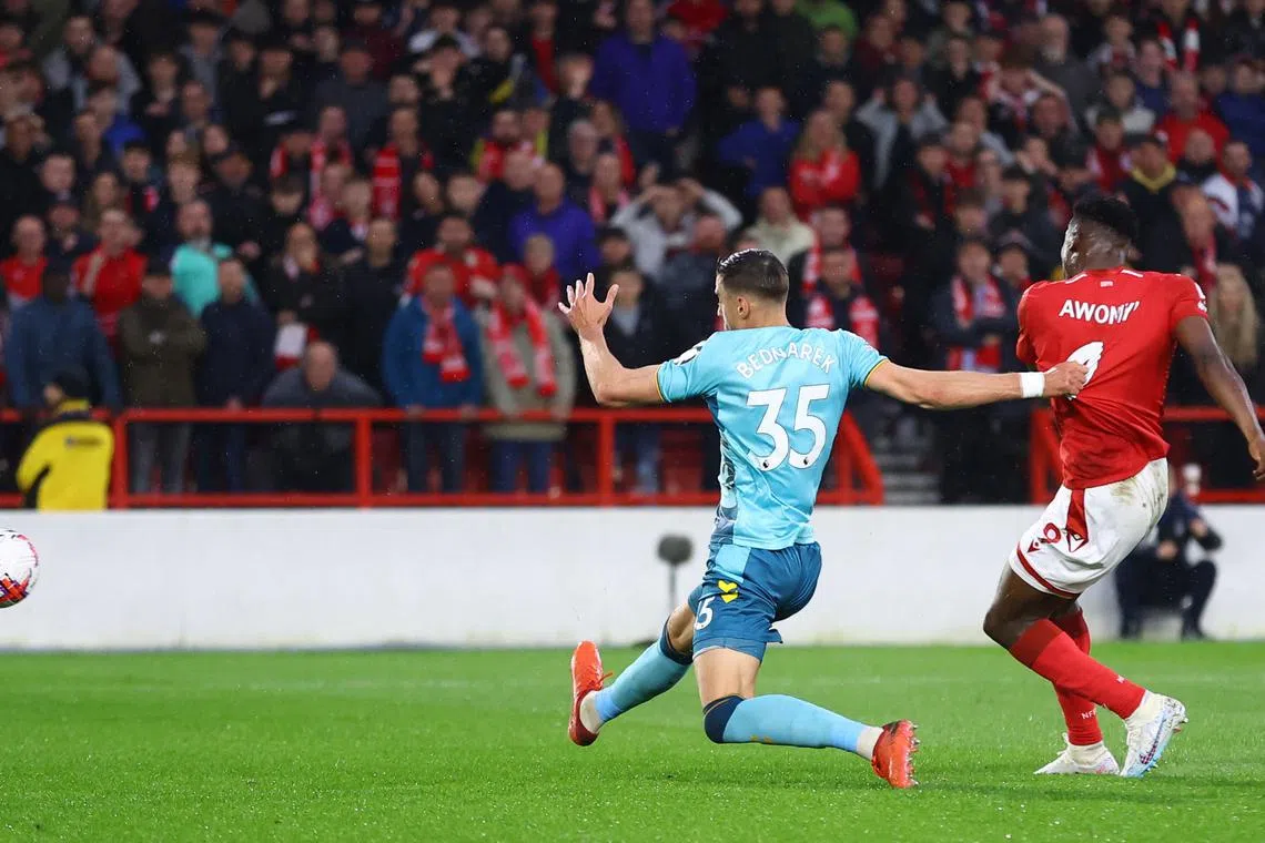 Nottingham Forest's Taiwo Awoniyi scores their first goal.